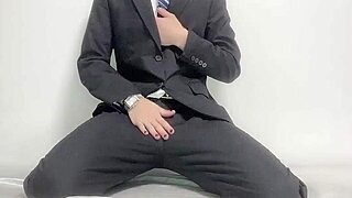 Busy handsome businessman can't resist his suit routine, aoidick.