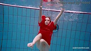 Cute babe swimming in red sexy open dress 😍