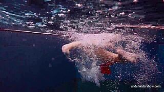 Cute babe swimming in red sexy open dress 😍