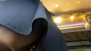 That sexy MILF in lingerie flashes her pussy under skirt, showing long legs and ass in voyeur upskirt.