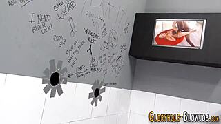 Busty redhead at gloryhole with tattoo