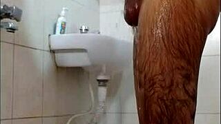 dude jerks off in the shower and shoots his load