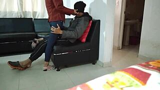 My masked neighbor gives me a blowjob in the living room.