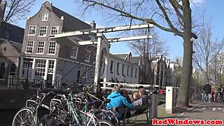 young tattooed woman rides an older tourist