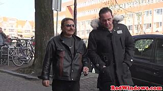 young tattooed woman rides an older tourist