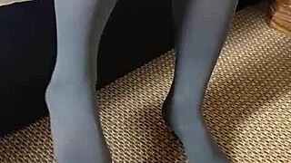 Erika teases in sexy stockings, garter belt, and lingerie, showing off her great ass