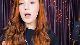amazing redhead fingering herself on webcam