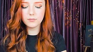 amazing redhead fingering herself on webcam