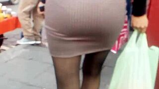 Tempting asses in public outdoor