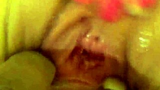 Petite European amateur with pendulant tits masturbates and gives interracial handjob