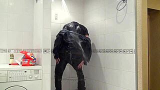 master in blue jeans washing in bathroom