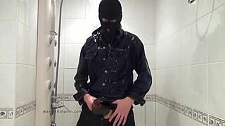 master in blue jeans washing in bathroom