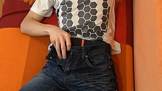 twink pulls foreskin while masturbating