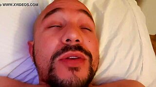 young woman masturbates alone in her comfortable bed