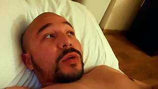 young woman masturbates alone in her comfortable bed