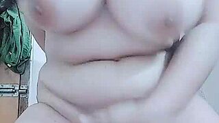 horny layla plays with big tits while fingering pussy in group scene.