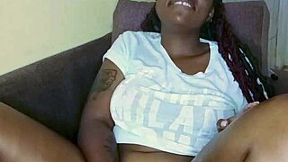 Look at this black babe teasing her pussy with big tits