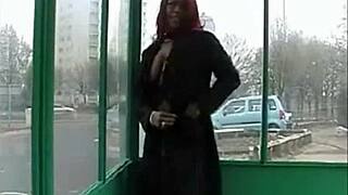 Ebony woman masturbates with toys in public park