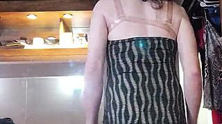 being naughty while modeling dresses, showing off big tits and sexy transsexual vibe