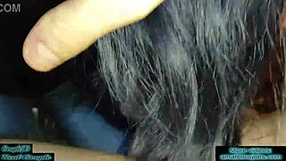 lady in black jerks and sucks fat cock close up