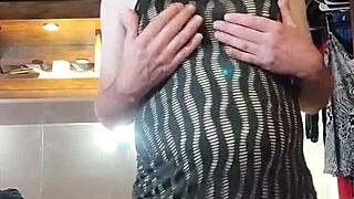 being naughty while modeling dresses, showing off big tits and sexy transsexual vibe