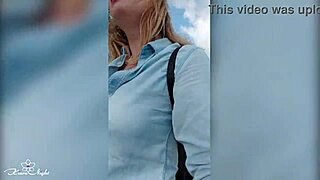 Blonde flaunts big tits in daring public nudity