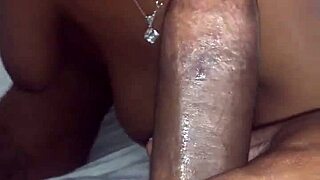 Ebony babe licks monster cock intensely