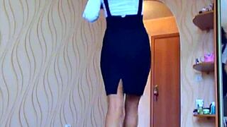 Beautiful cam girl in sexy skirt.