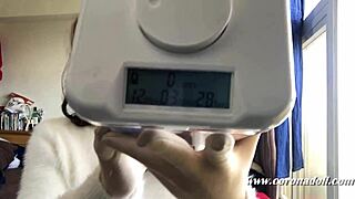 24-hour challenge in rubber doll kigurumi with hood and heels.