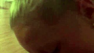 Is this milf wife sucking cock provocatively in the bedroom?