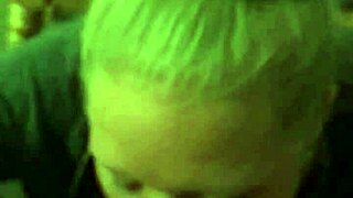 Is this milf wife sucking cock provocatively in the bedroom?