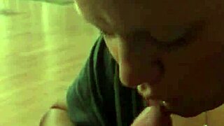 Is this milf wife sucking cock provocatively in the bedroom?