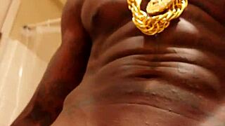 Masturbating black stud cums while worshiping BBC