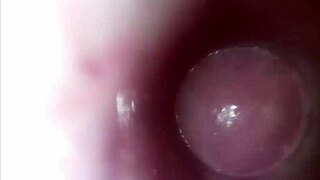 Camera inside her wet pussy as she fucks with huge dildo