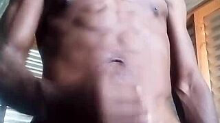 Kneeling and masturbating with big black cock and balls