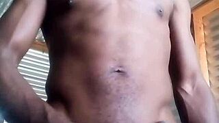 Kneeling and masturbating with big black cock and balls