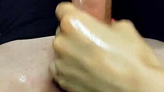 oiled handjob leads to climax