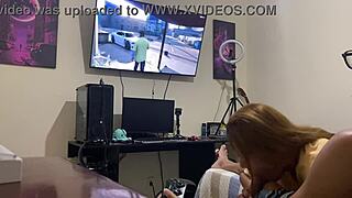 Sucking him quietly while he focuses on the video game.