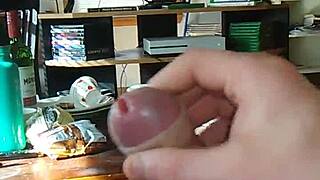 Solo transsexual performer jerks off while watching tranny porn, leading to intense cumshot