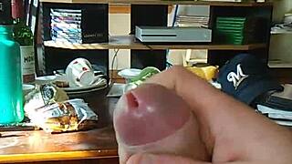 Solo transsexual performer jerks off while watching tranny porn, leading to intense cumshot