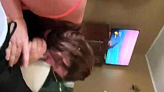 Amateur girl passionately sucks on hard cock