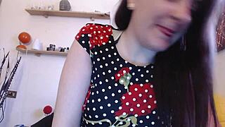 Nicoletta teases with big balloons. Her fetish passion is ready to thrill you.