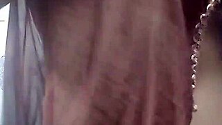 Romantic couple shares intimate moments in the bathroom