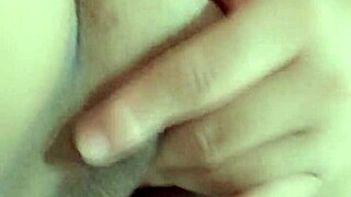 Beautiful Amateur Moans While Fingering Wet Pussy on Bed