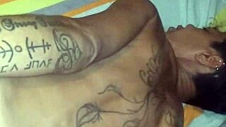 Athletic couple with tattoos enjoy passionate sex