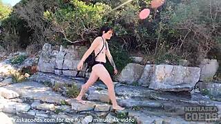 Why's this hot chick naked on a public beach?