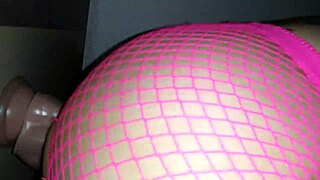 Playing with dildo and sucking on toy.