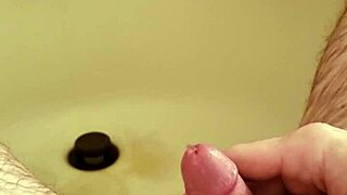 Old Man Gives Golden Shower To Small Cock