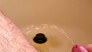 Old Man Gives Golden Shower To Small Cock