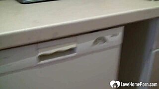 blonde milf with big natural tits teases in the kitchen